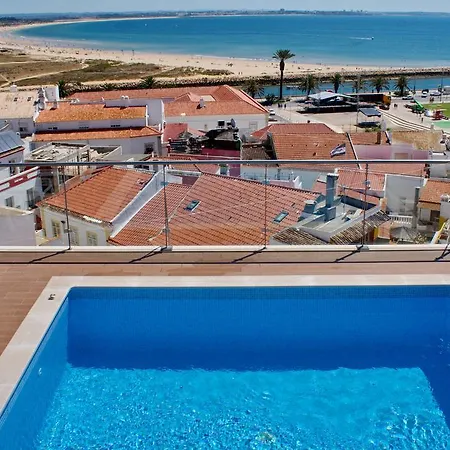 Topcity & לאגוּ‏ש