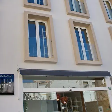 Topcity & לאגוּ‏ש