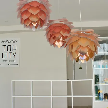 Topcity & *